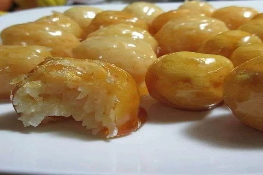 Bala de coco caramelizada