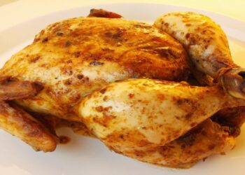 Frango assado inteiro na airfryer bem suculento para sua refeição